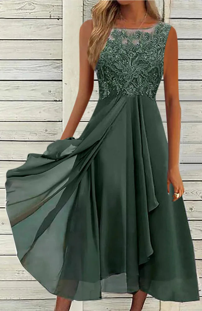 Women's sleeveless green chiffon dress with white lace hollow-out detail, mid-length skirt.