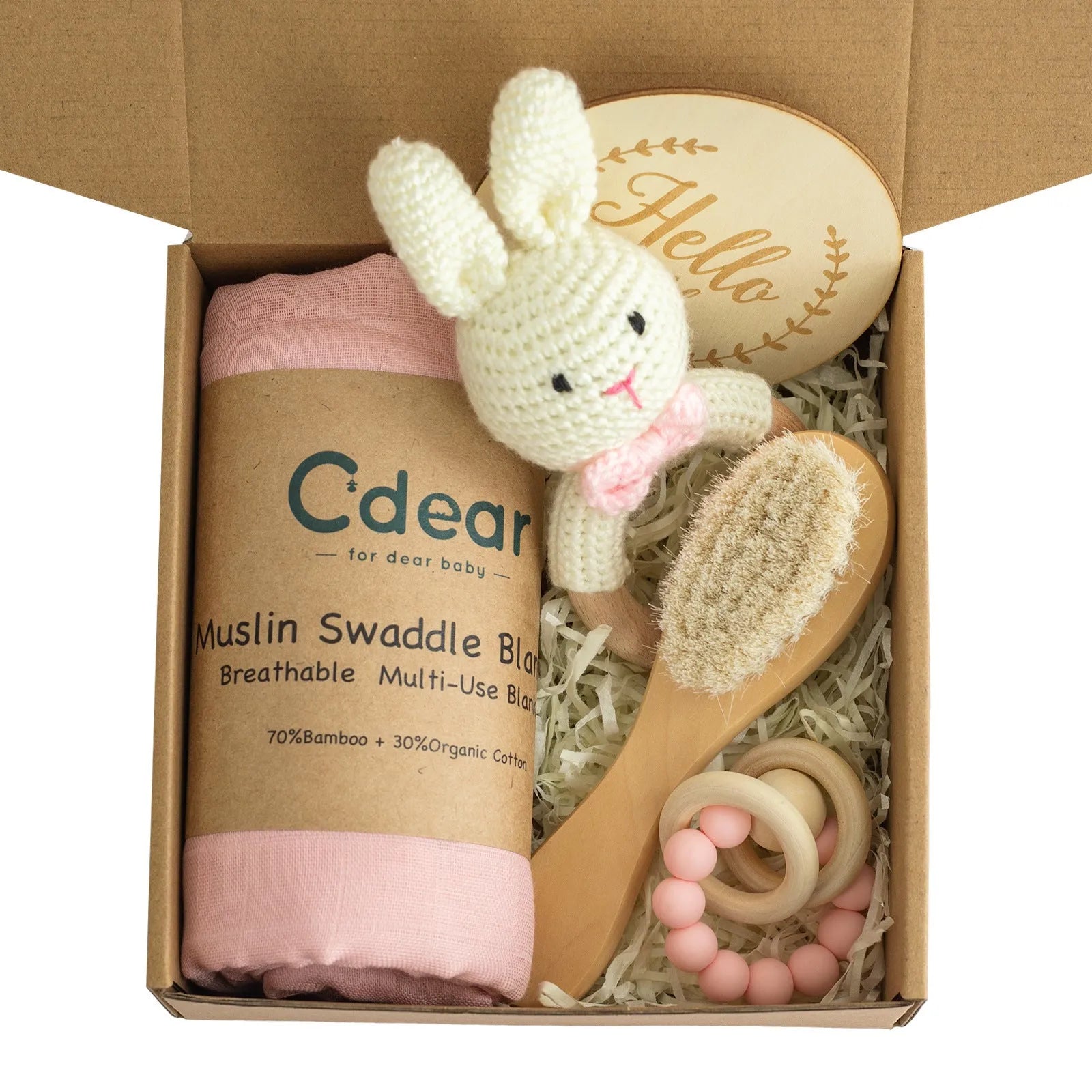 Baby teething gift set with bamboo gauze blanket, wooden chewing ring, woven bell, and developmental toys