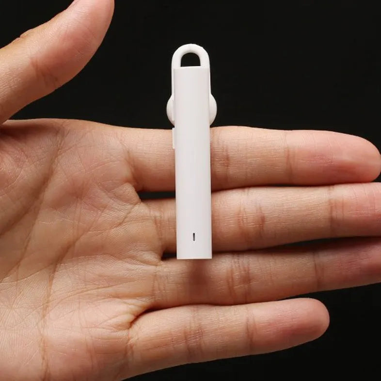 Compact wireless Bluetooth headset measuring 5.6cm with black and white colour options