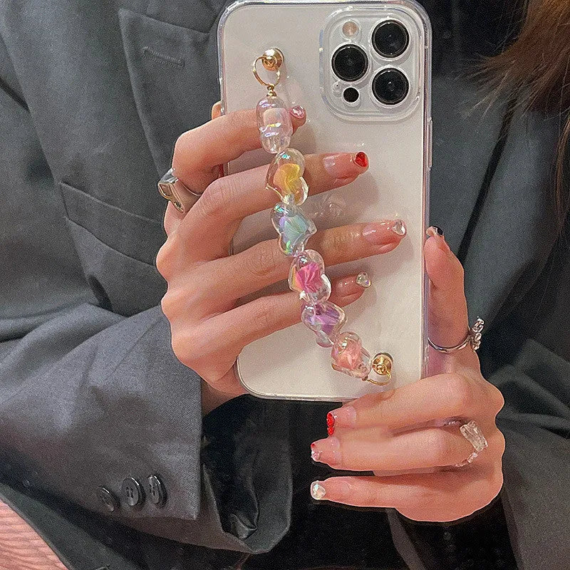 Transparent TPU iPhone case with handmade beaded candy chain and girly heart laser colour design on the back