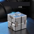 Zinc alloy infinity cube fidget toy showing black and silver colour options, sized at 4cm.