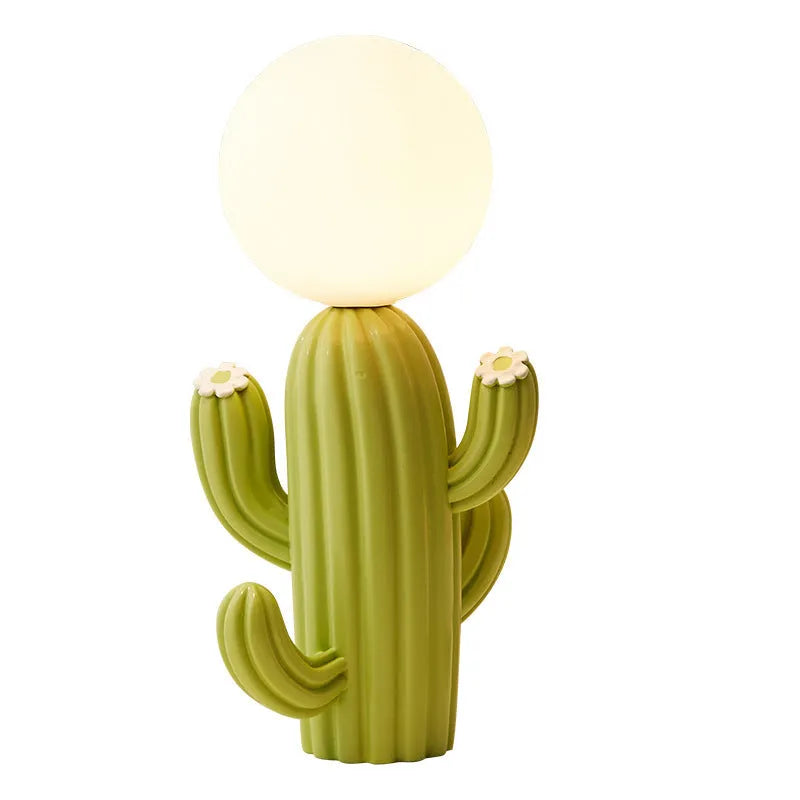 Green cactus button desk lamp with three-colour accents on a bedside table in a child's room