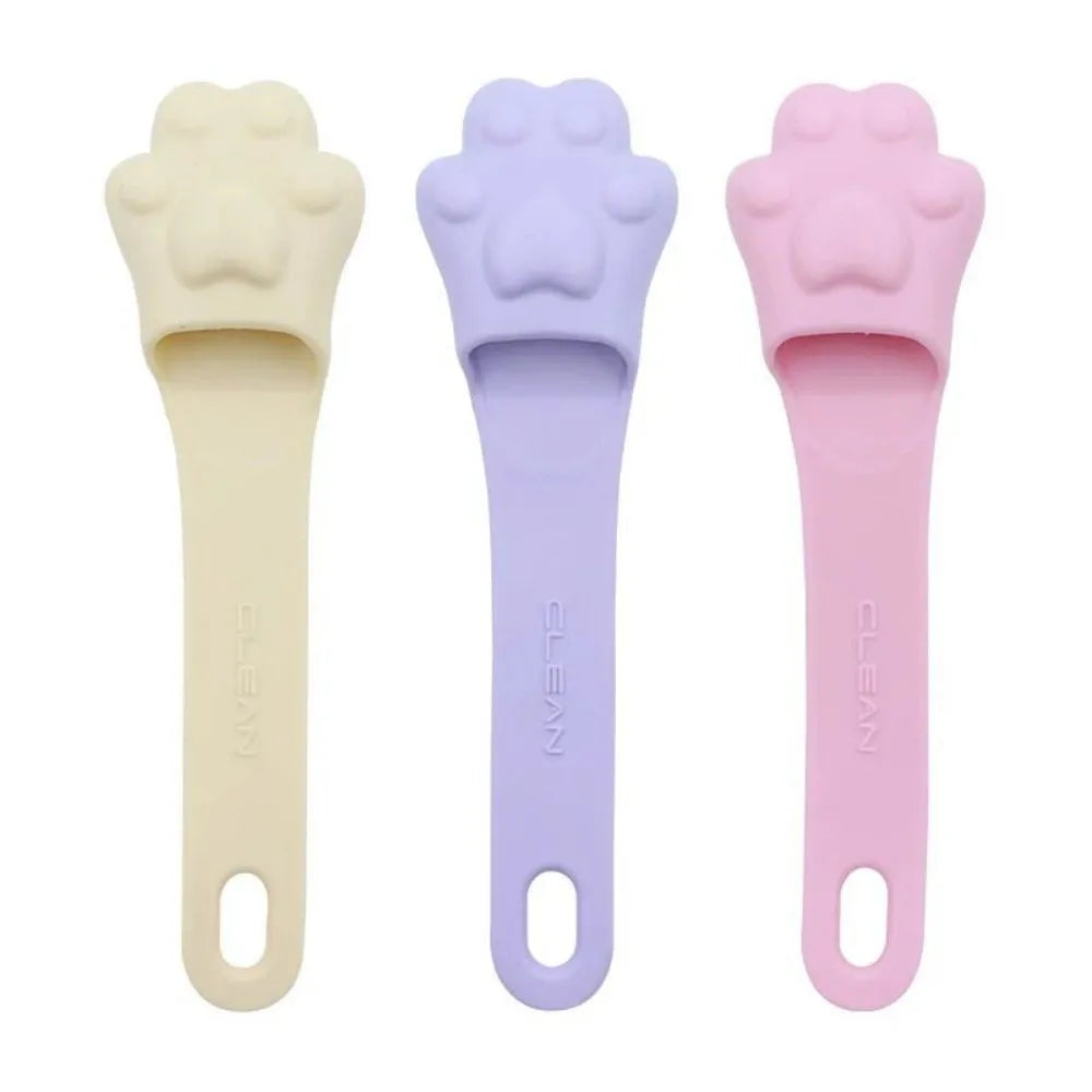 Silicone finger toothbrush for pets in pink, purple and yellow colours for dog and cat dental care