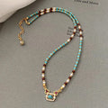 Natural turquoise pearl necklace on copper base with real gold plating, geometric pendant, French retro style, clavicle length for women