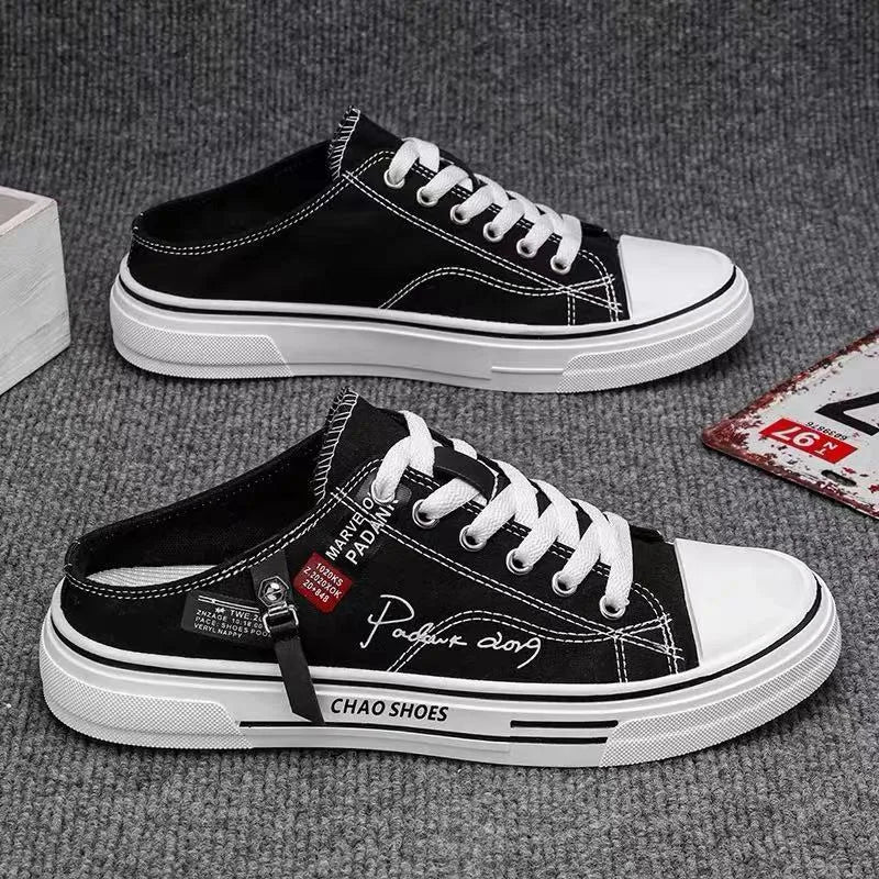 Men's black canvas slip-on shoes with round toe and PVC sole