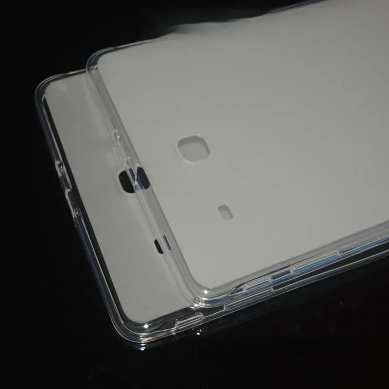 Clear transparent white silicone and TPU ultra-thin tablet protective case laid flat.
