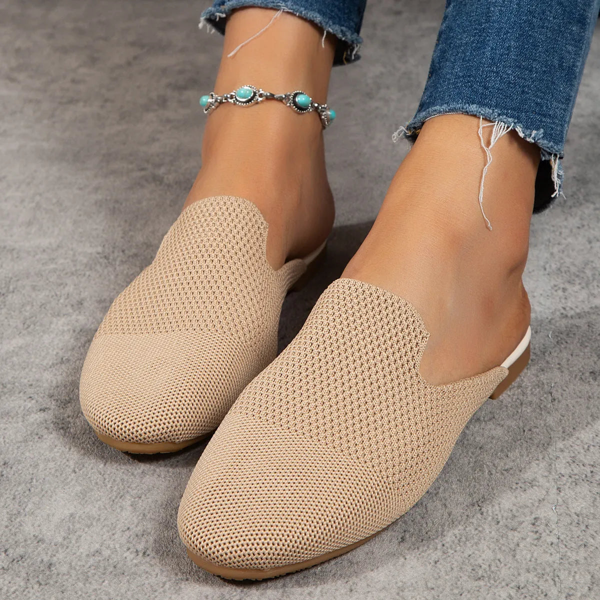 Adult mesh sandals with cloth upper in apricot colour showing slip-on flat sole design
