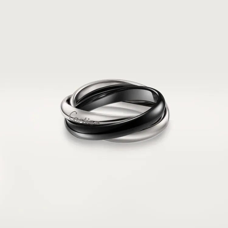 Geometric U-shaped sterling silver couple's ring on a finger, showcasing the full diamond option with 18 stones and flat band interior for engraving.