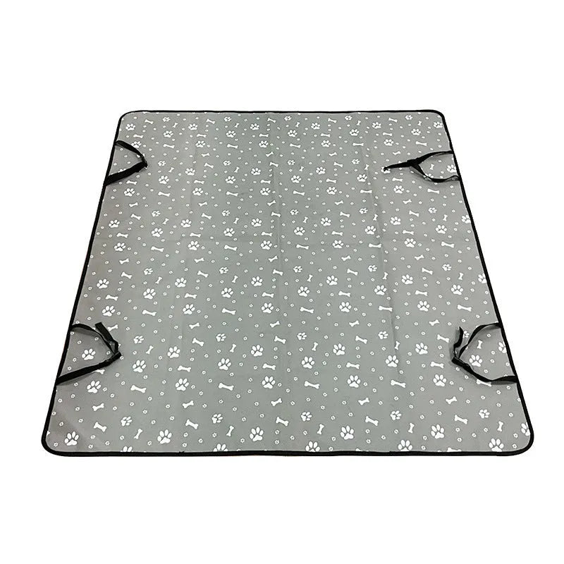 Grey car pet mat with dog bone print covering a vehicle's rear seat.
