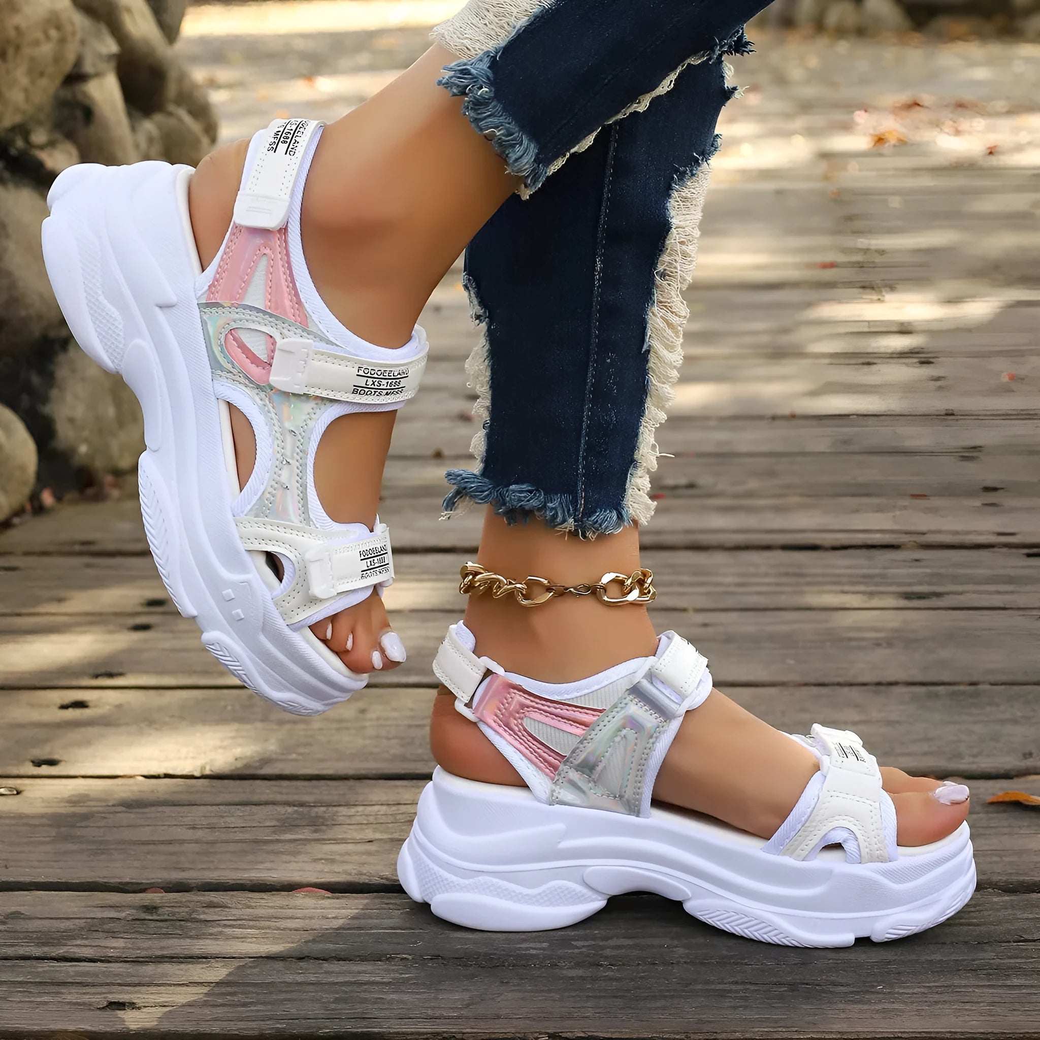 Women's white PU Roman platform sandals with a rubber sole on a plain background.