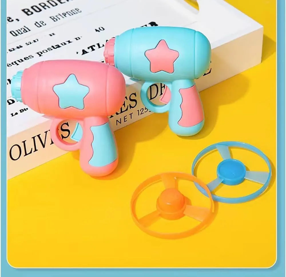 Blue plastic cat toy gun with spinning disc launcher for indoor feline entertainment