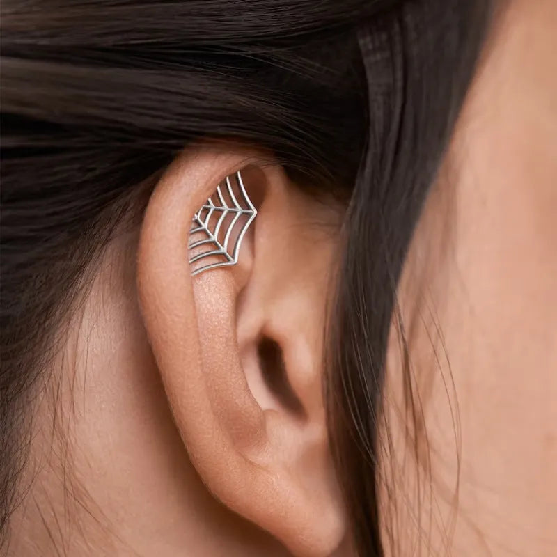 Geometric spider web metal stud earrings with electroplated gold and silver finish options