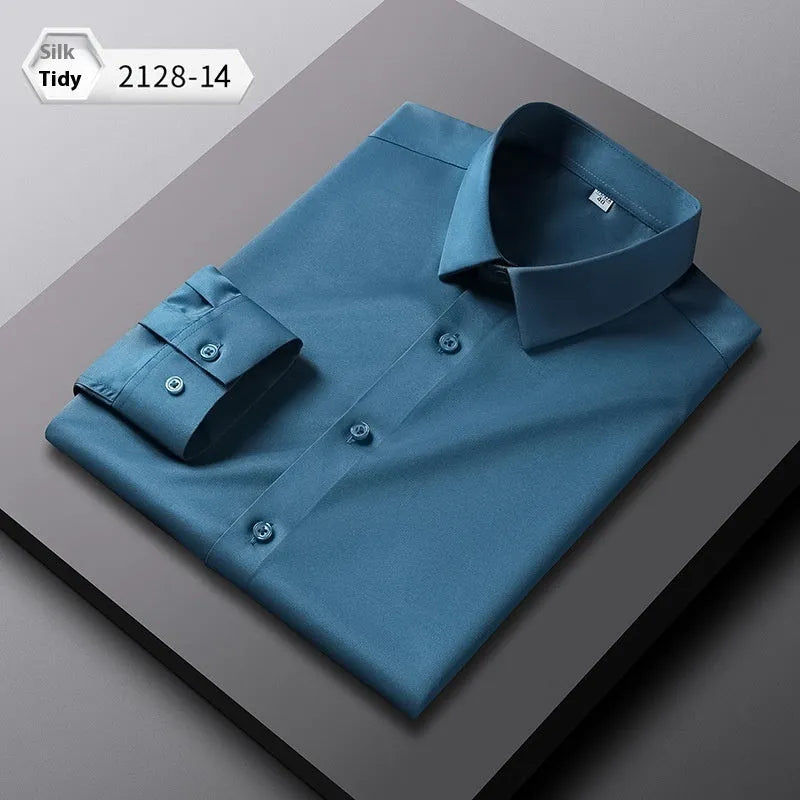 Men's solid colour long-sleeved shirt in a loose, non-ironing polyester and spandex fabric.