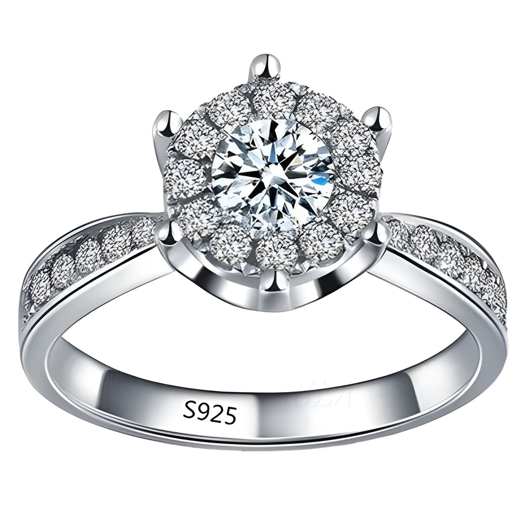 Sterling silver engagement ring with eight heart eight arrow cut zircon gem on white background