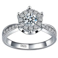 Sterling silver engagement ring with eight heart eight arrow cut zircon gem on white background
