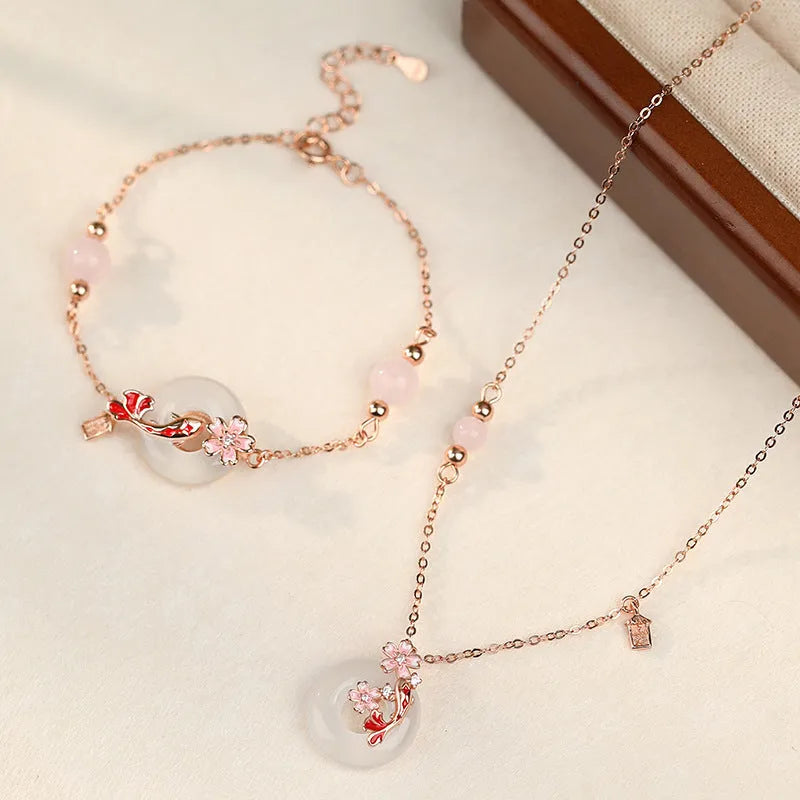 S925 sterling silver bracelet with white chalcedony crystal in a flower and koi pattern design.