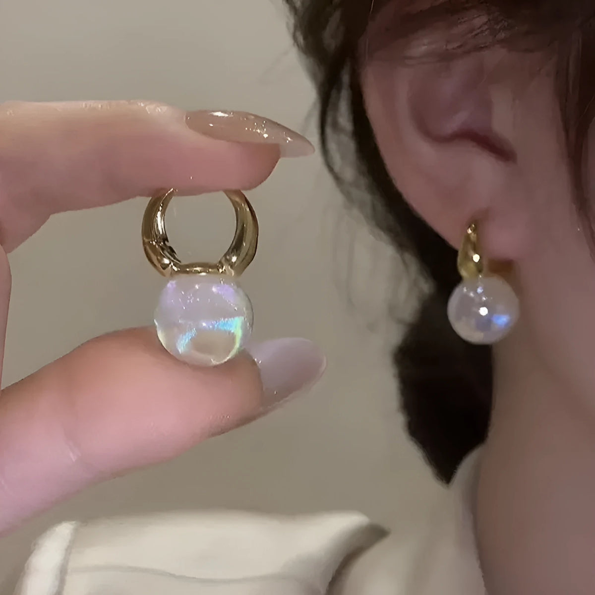 Mermaid pearl earrings for women with 14K gold finish and white pearl element