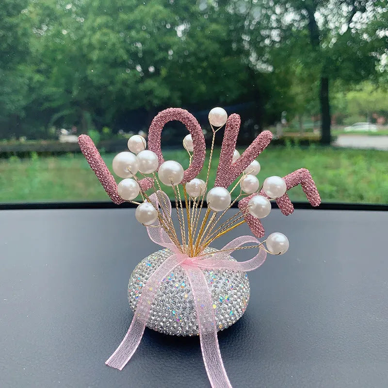 Clay diamond star decoration ornament for a car centre console in a modern colour design.