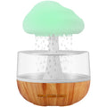 White cloud-shaped humidifier with colour changing night light and essential oil diffuser
