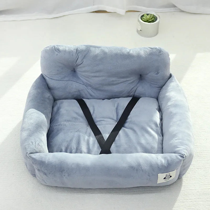 Grey and blue plaid cloth car-mounted dog travel nest shown in two size options.