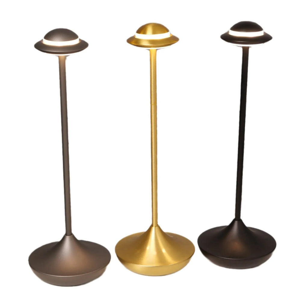 Modern UFO-shaped table lamp in grey with a circular shade on a weighted base, showing touch controls.