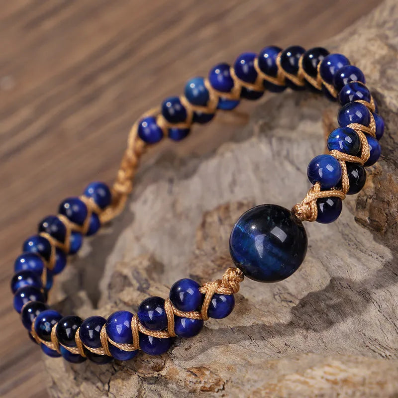 Handmade woven geometric pull bracelet with Tigereye and Amethyst beads in blue and purple colours
