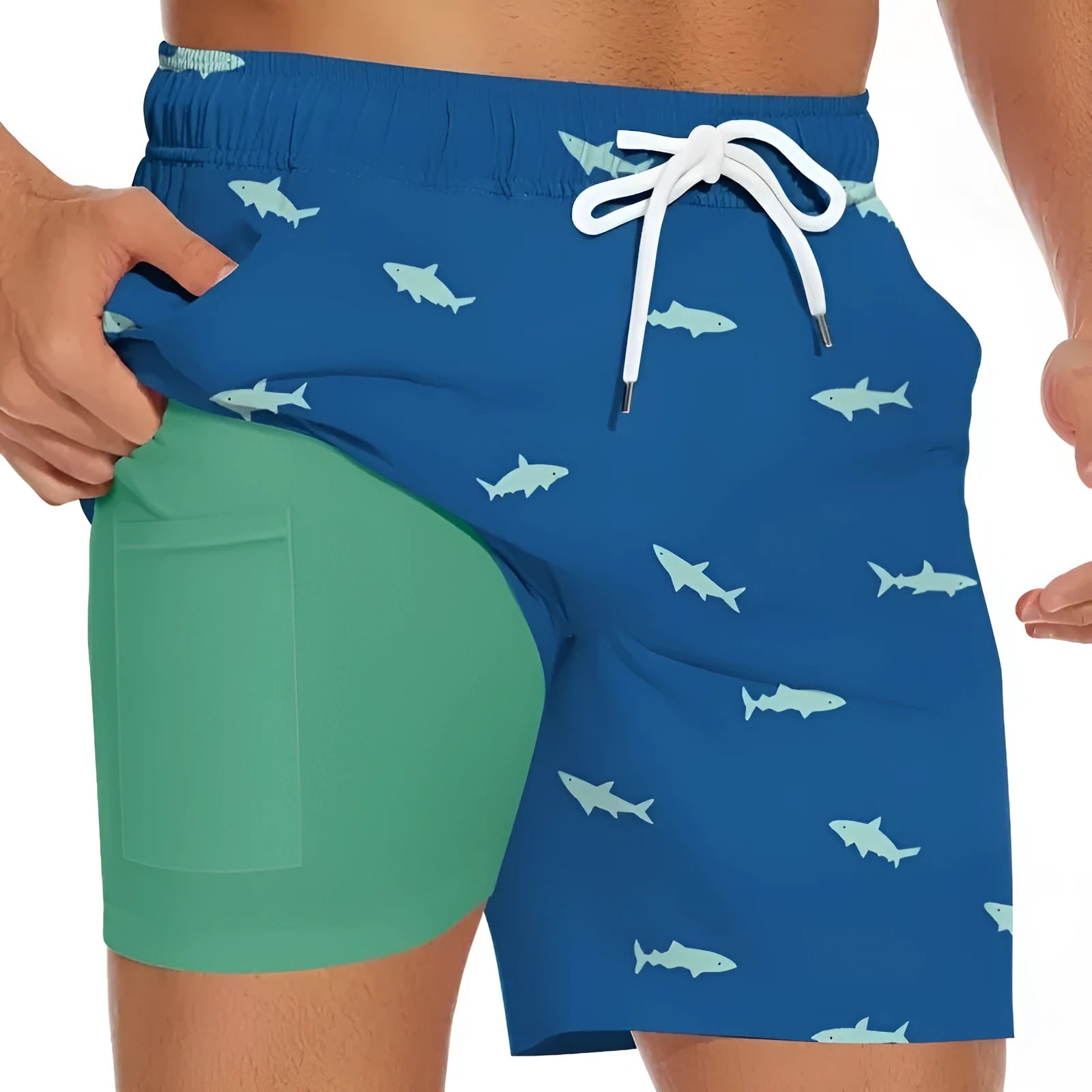 Men's blue shorts with a shark graphic print and a white drawstring waistband.
