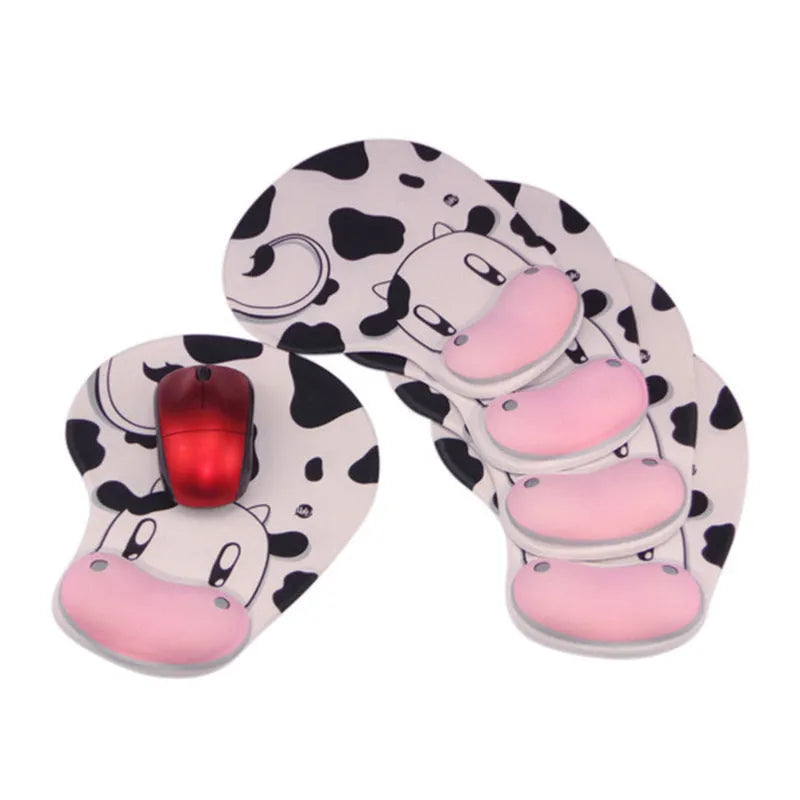 Cow silicone wrist mouse pad with soft hand rest and non-slip base on a desk