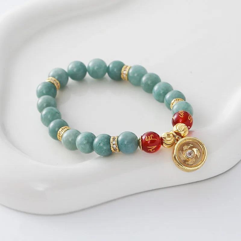 Natural agate bracelet with geometric jade-toned beads and lotus seedpod design