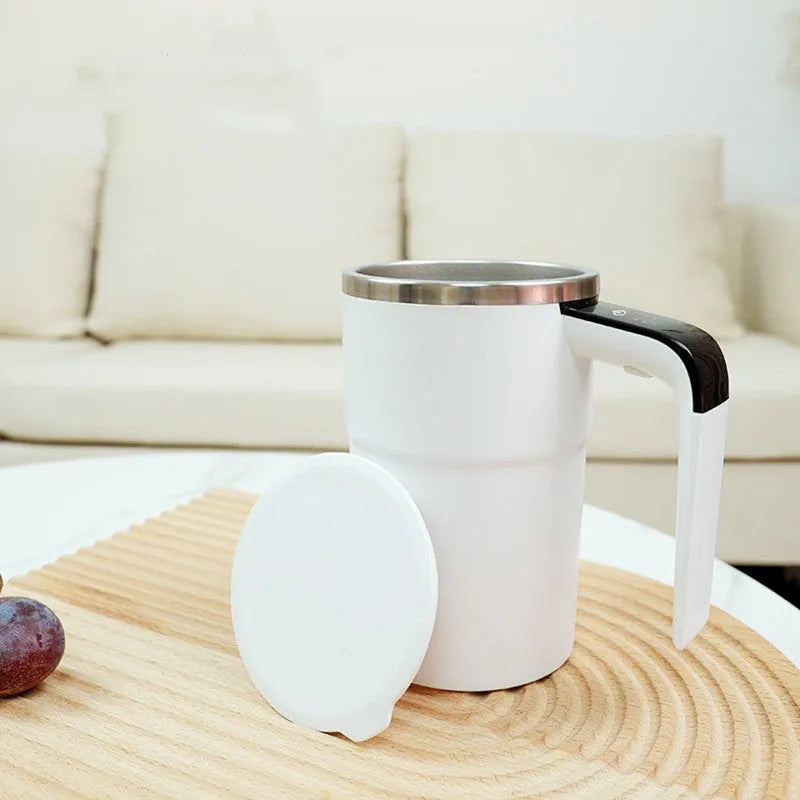 White automatic magnetic stirring mug with LCD display showing temperature reading