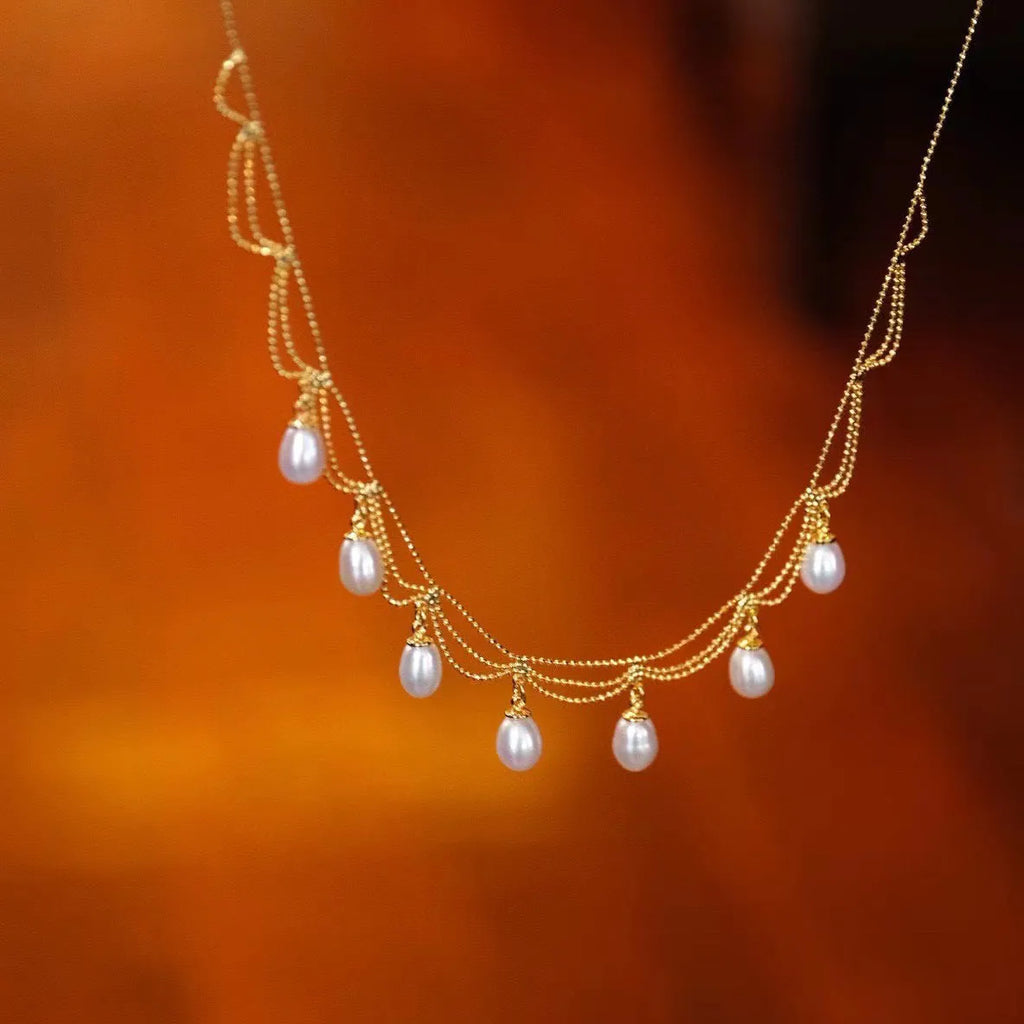 Vintage natural freshwater pearl necklace on display, 45cm clavicle chain with 14K gold plated clasp, handmade pearl lace style