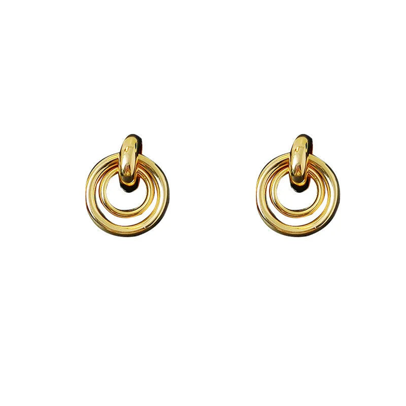 Geometric round ring earrings with irregular shape in gold and silver colour options