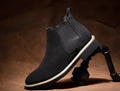 Men's black 6cm hidden elevator shoe with cowhide upper, pointed toe, rubber sole, and sewn thread detailing