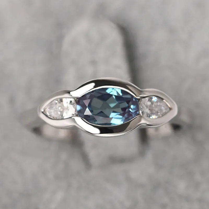 Geometric ellipse women's ring with white gold plating and inlaid zircon stones