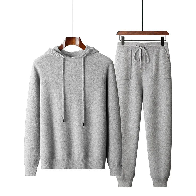Men's light grey cashmere hooded sweatshirt and long pants casual winter set laid flat.