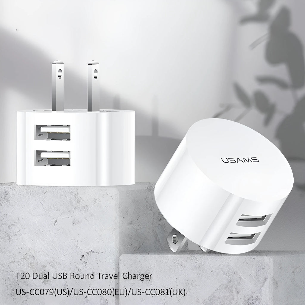White portable universal dual USB phone charger with US, EU, and UK plug heads