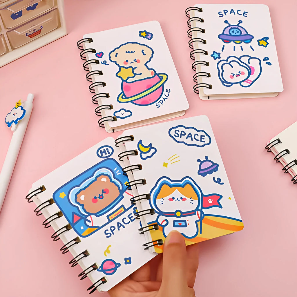 Astronaut Series portable pocket flipper notebook showing one of four cover designs: Astronaut Bear, Planet Teddy, Space Cat, or UFO.