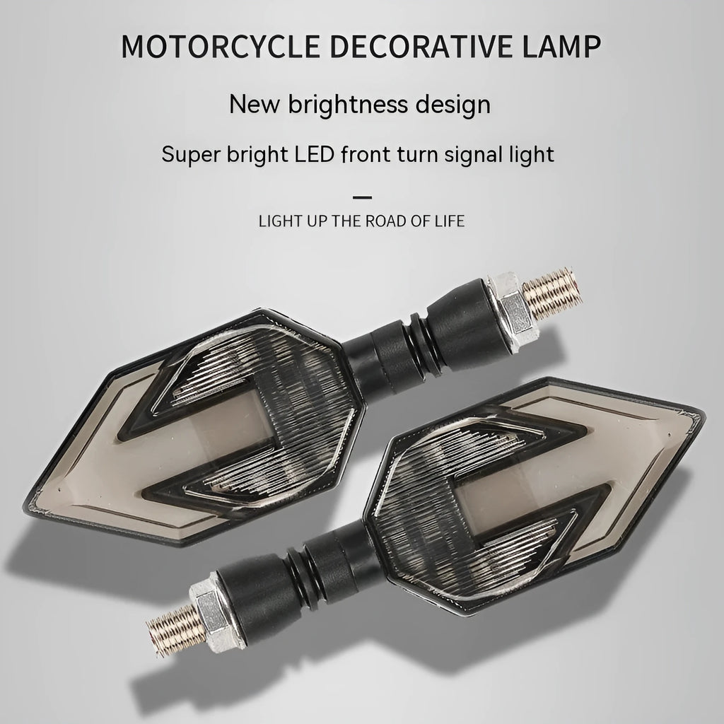 Arrow-shaped LED motorcycle turn signal lamp in ABS plastic housing for 12v universal vehicle fit.