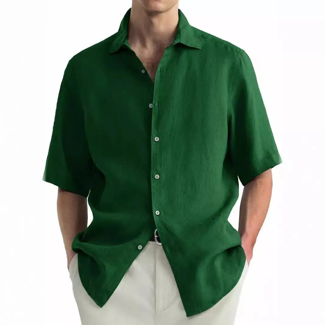 Green washed cotton men's casual shirt with a cardigan style on a hanger.