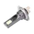 Close-up of an H7 LED fog light bulb with aluminium housing and multiple small LED chips visible.