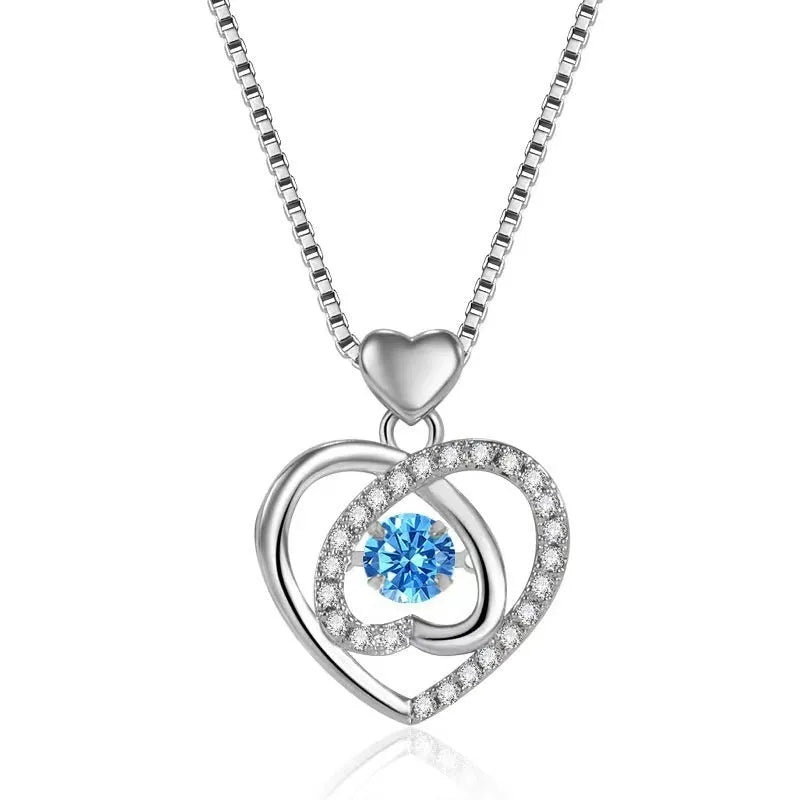 Blue diamond heart pendant necklace and matching bracelet jewellery set with gem inlay on electroplated copper