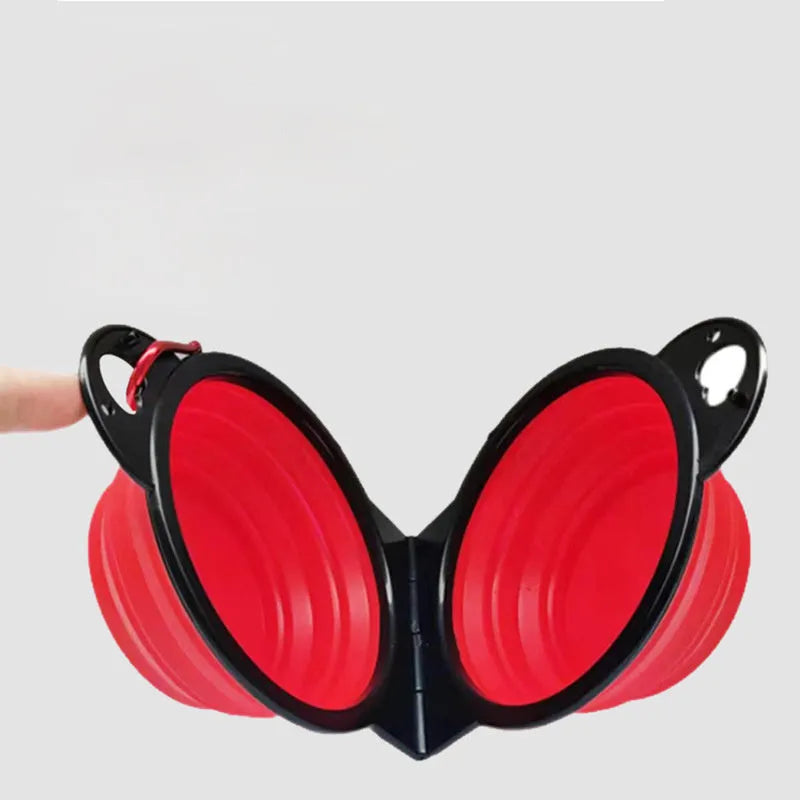 Blue silicone folding double pet bowl showing two compartments, collapsed flat next to it.