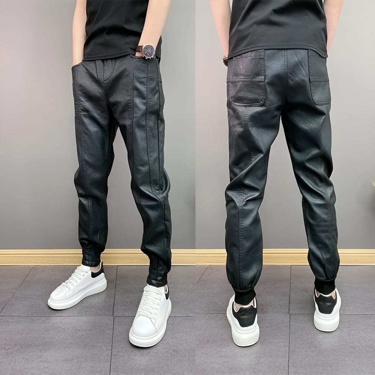 Black slim-fit waterproof motorcycle trousers in artificial leather with mid-rise waist and tapered leg