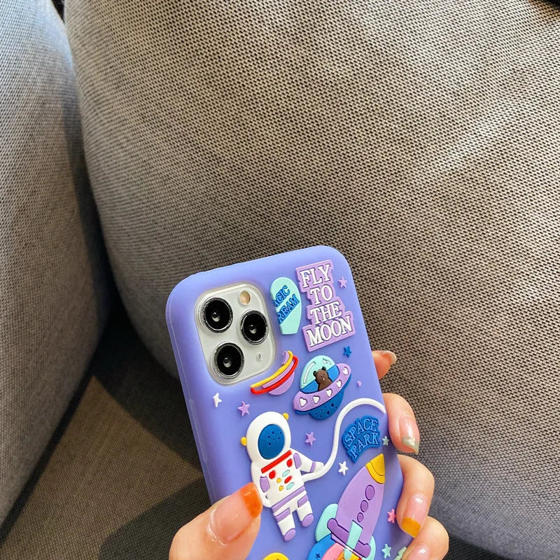 Purple silicone iPhone case with cartoon astronaut design for multiple models