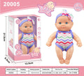 Vinyl baby figurine doll in display with colour variations and measurement scale