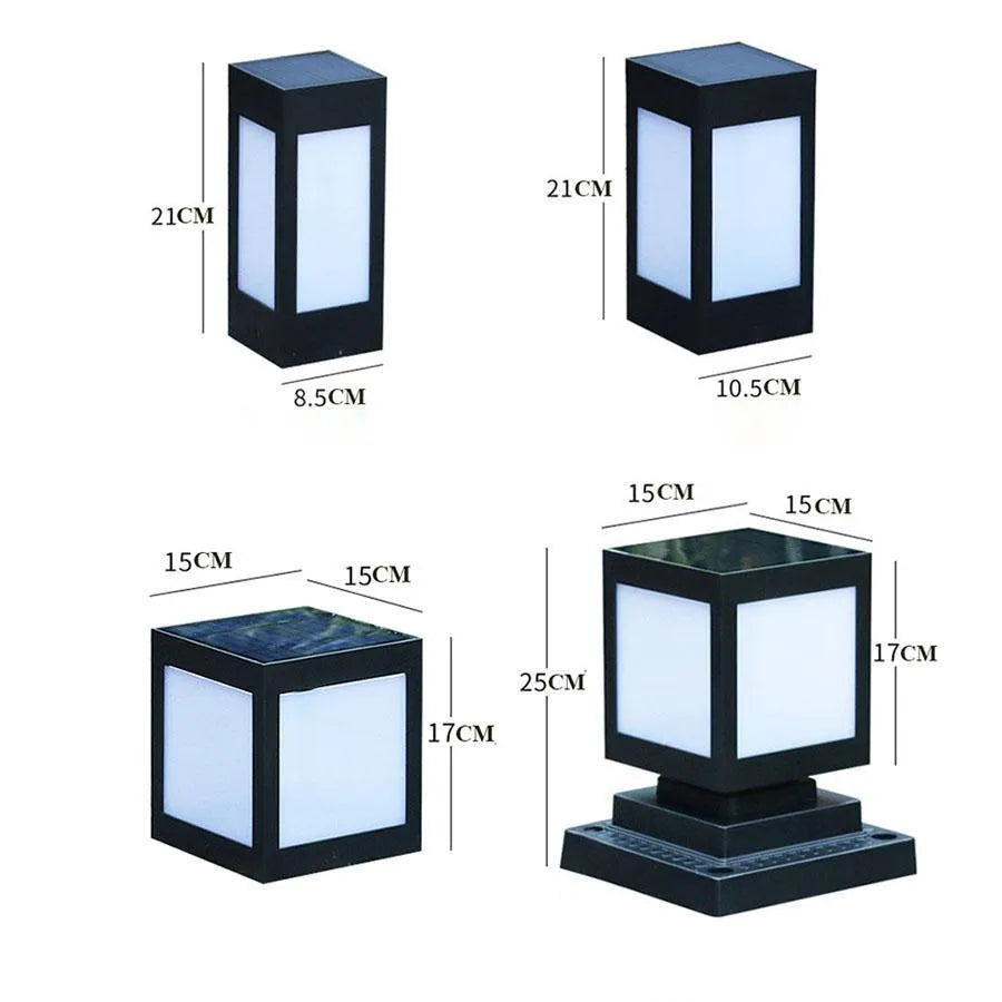 Set of four different styles of solar-powered LED garden lights for outdoor use.