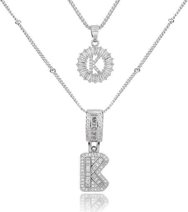 26 English letters copper-plated gold diamond initial pendant necklace with adjustable chain on display