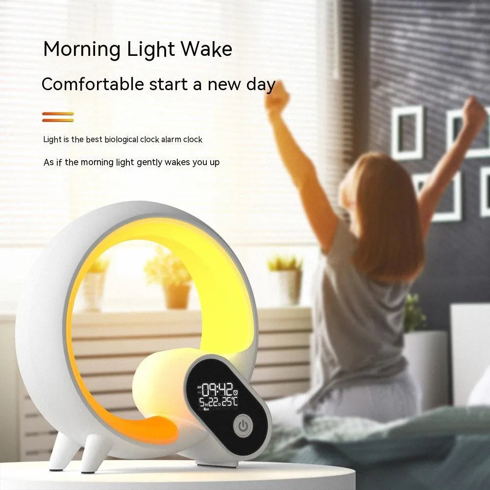 Creative Q Light sunrise alarm clock with digital display and colourful LED ring in black or white finish.