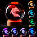 Galaxy Moon small night lamp with RGB light and salamander design, 6cm size on a desk