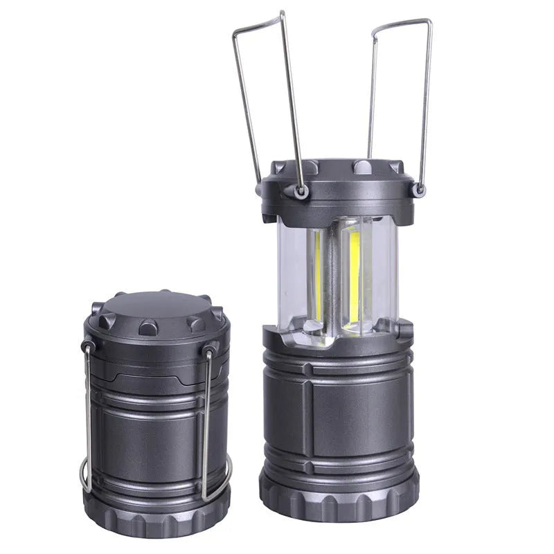 Multifunctional COB camping lantern in gold with solar panel, telescopic body, and stainless steel fold-away handles
